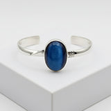 Silver bracelet with a blue stone on a white background 61.00ct