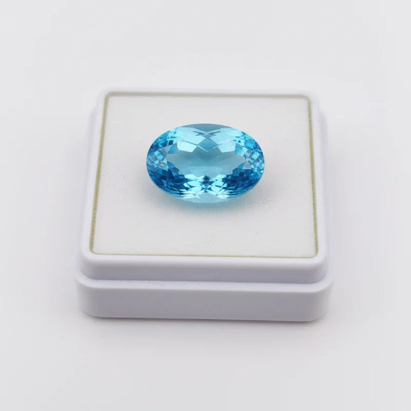 swiss blue topaz on white box.