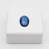 Blue cat's eye 58.55ct gemstone on a white background