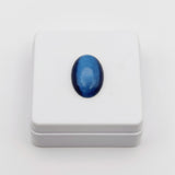 Blue cat's eye gemstone on a white background 61.00ct