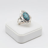 nishapur turquoise 74.90ct Silver ring with a turquoise stone on a white box