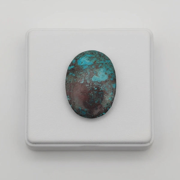 nishapur turquoise stone 60.00ct stone on a white background