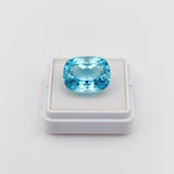 swiss blue topaz round stone 39.85ct Blue gemstone on a white background