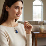 cat eye 59.50 ct Woman wearing a necklace with a blue pendant in a living room setting