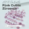 121.8 carat lot of sparkling pink cubic zirconia round cut loose gems beautifully displayed for custom jewelry design.