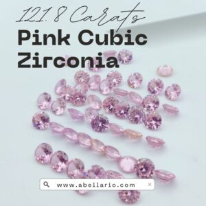 121.8 carat lot of sparkling pink cubic zirconia round cut loose gems beautifully displayed for custom jewelry design.