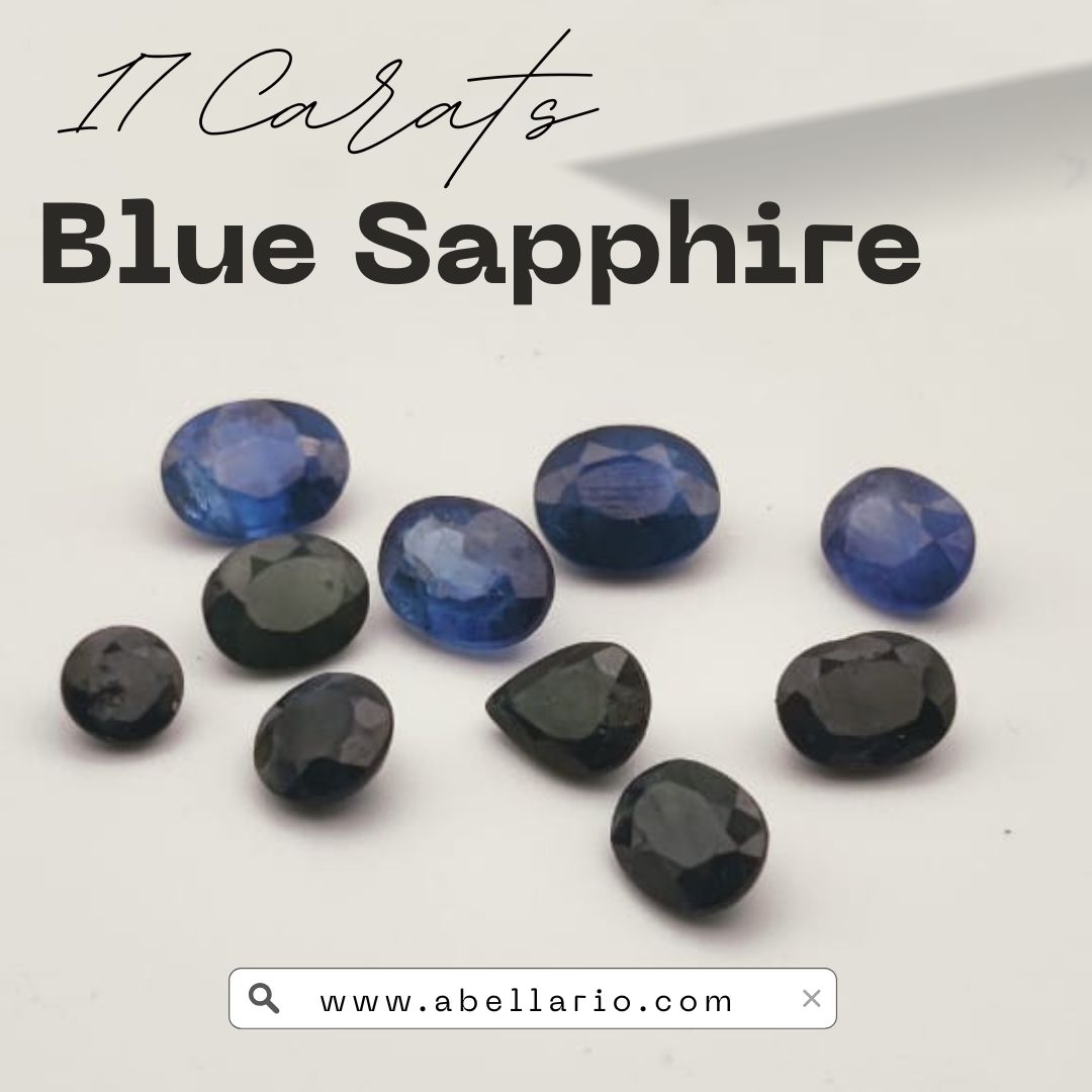 Collection of 10 natural blue sapphire gemstones totaling 17 carats, featuring oval and pear shapes with deep blue and dark tones, displayed on a white background, promoted by Abellario.